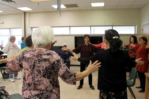 Older adults practicing tai chi