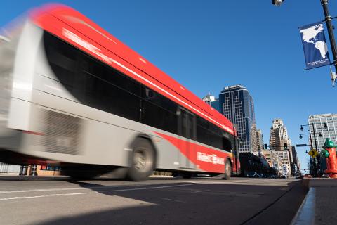 Bus in motion in downtown Kansas City