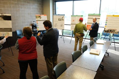 People talking at transportation planning open house