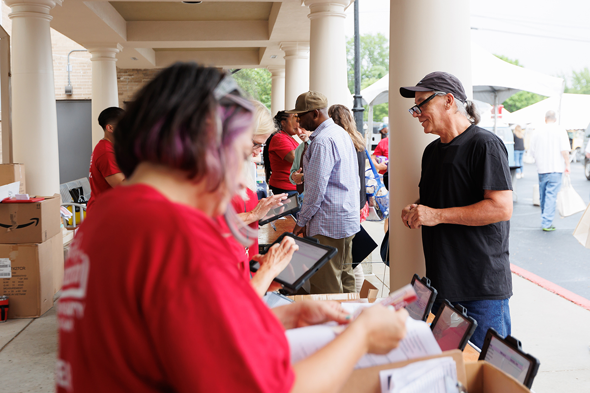 People registering for a large event