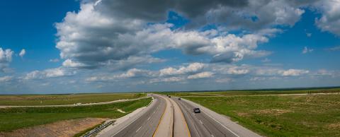 Highway with blue sky and clouds