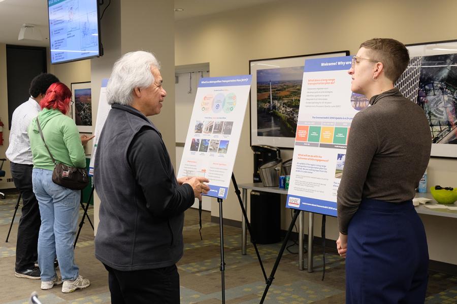 Attendees at a Connected KC 2050 update open house shared input with MARC staff members.