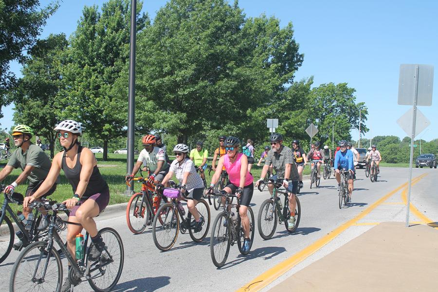 Community members riding bikes during the community bike ride