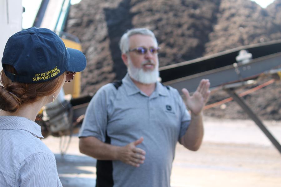 Kevin Anderson from Missouri Organics leads tour of his facility while EPA Region 7 staffer in marked ballcap watches on