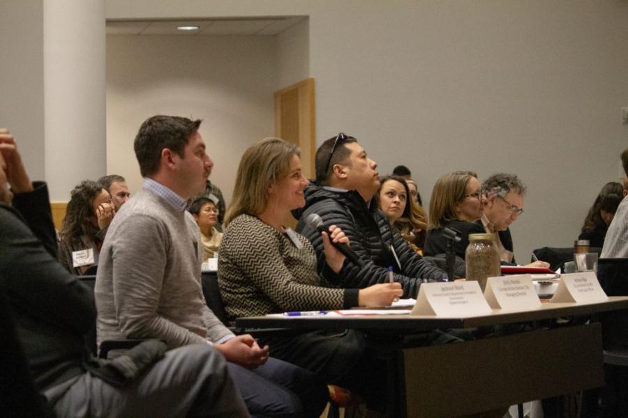 Judges from Johnson County, City of KCMO and Climate Action KC ask questions of pitch participants