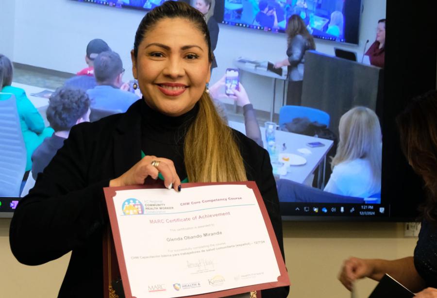 chw spanish class student with certificate